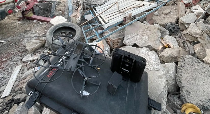 Aerial drone being shown in Turkey/Syria earthquake placed on some rubble.