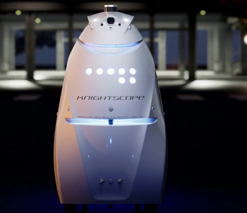 K5 AI-driven autonomous security robot in a car park.