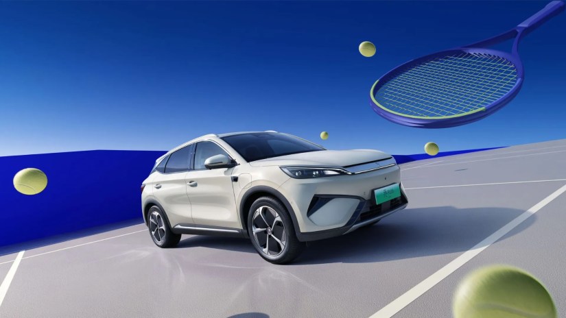 Front three-quarter view of the BYD KV parked on a tennis court.
