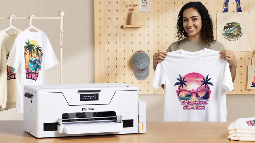LOKLiK iPrinter DTF on table with woman holding up t-shirt