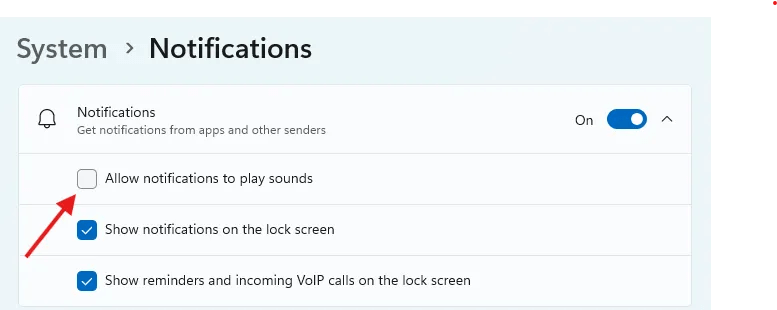 Notification settings in Windows 11 with an arrow pointing to the &lsquo;Allow notifications to play sounds&rsquo; option.