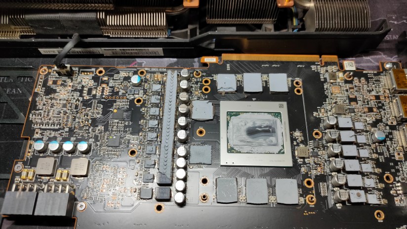 Old thermal paste and pads on an AMD RX 6800 XT.