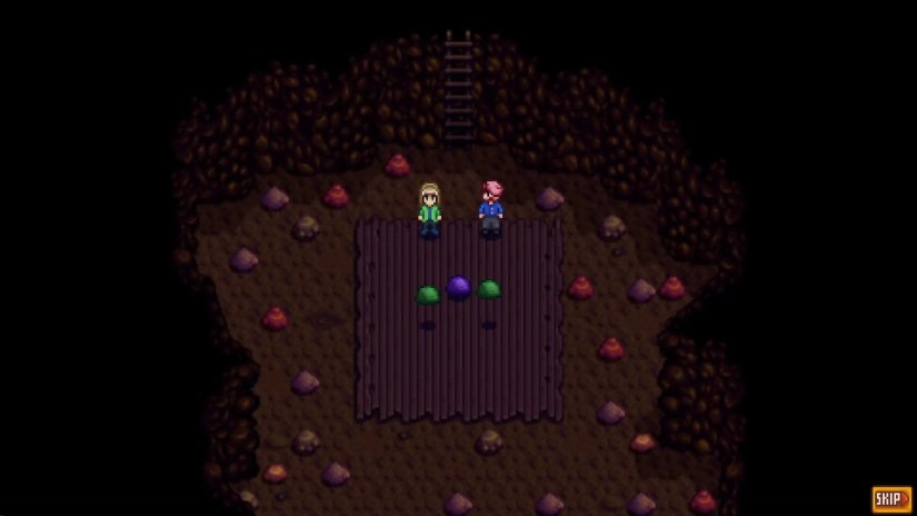 Two Stardew Valley characters stand in front of a trio of friendly slimes in a cave.