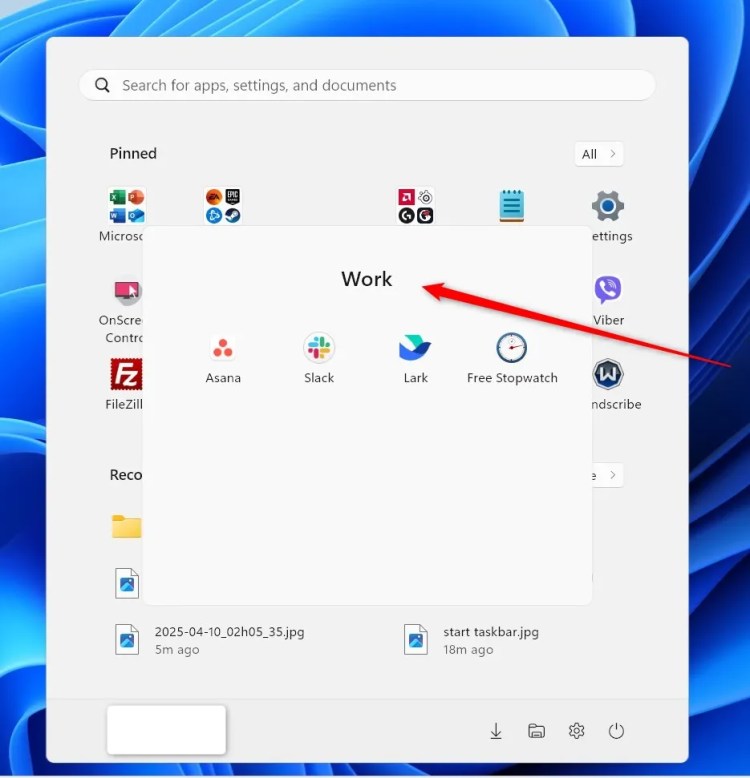 A Windows 11 Start Menu folder called &ldquo;Work&rdquo; that includes Asana, Slack, Lark, and Free Stopwatch.