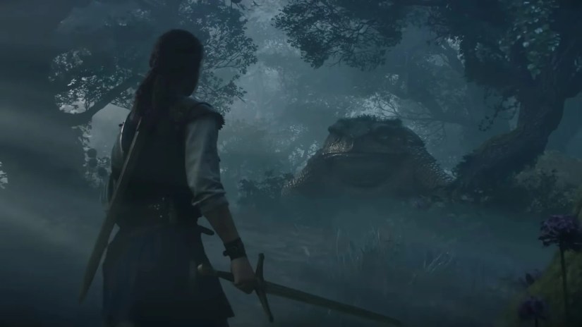 The Fable hero readies to battle a giant toad enemy.