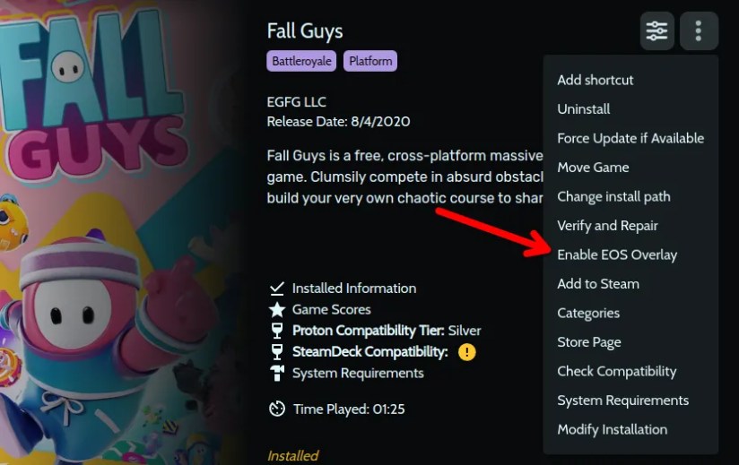 Fall Guys launch page in Heroic Games Launcher with an arrow pointing to the Enable EOS Overlay menu option.