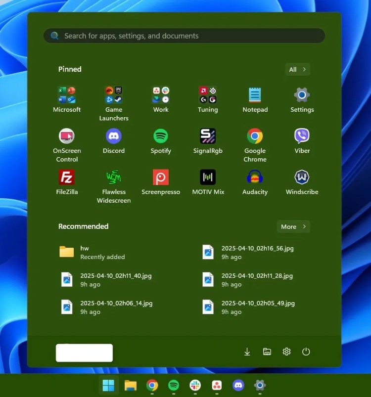 A green Windows 11 Start Menu.