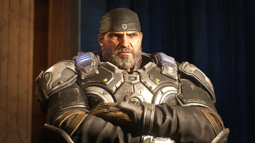 Marcus Fenix standing with his arms folded in Gears of War 5.
