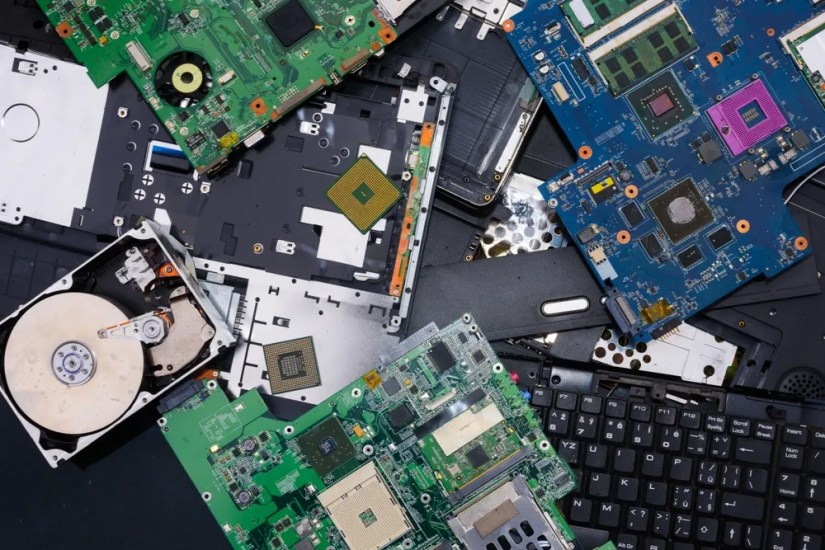 A bunch of disassembled computer parts.