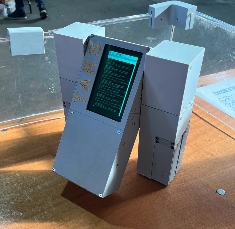 A miniature TARS robot run by a Raspberry Pi inspired by the Interstellar movie.