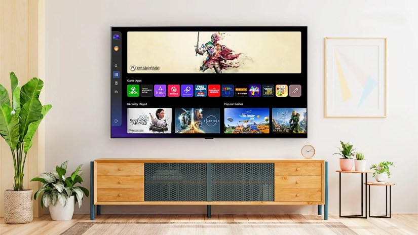 Xbox Game Pass on LG over tv stand.