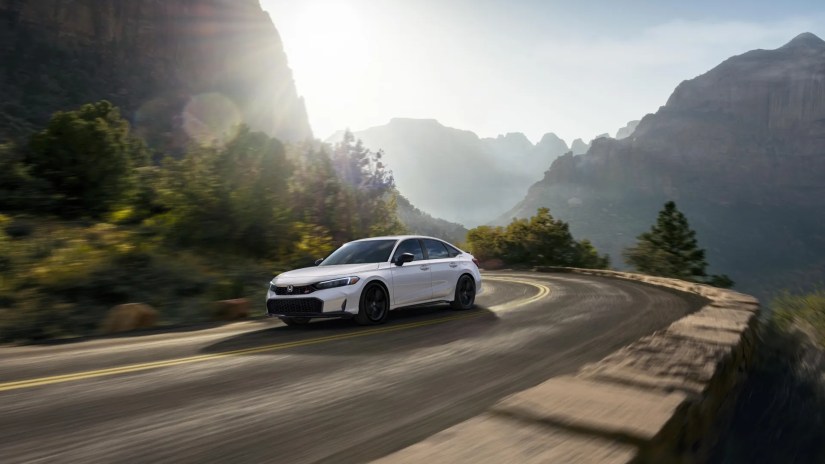 Front 3/4 action shot of a 2025 Honda Civic Si