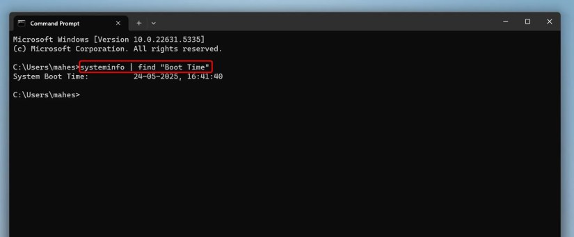 The command to view the last reboot typed in Command Prompt.