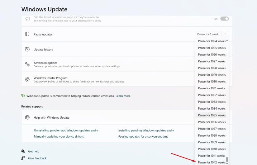 Pause of 1042 weeks option in Pause Updates drop-down menu.
