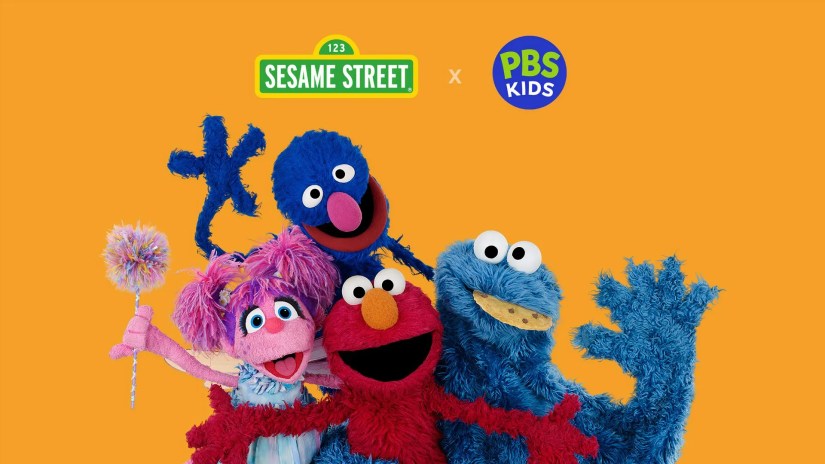 Sesame Street and PBS Kids logo with Elmo, Abbie, Grover, and Cookie Monster