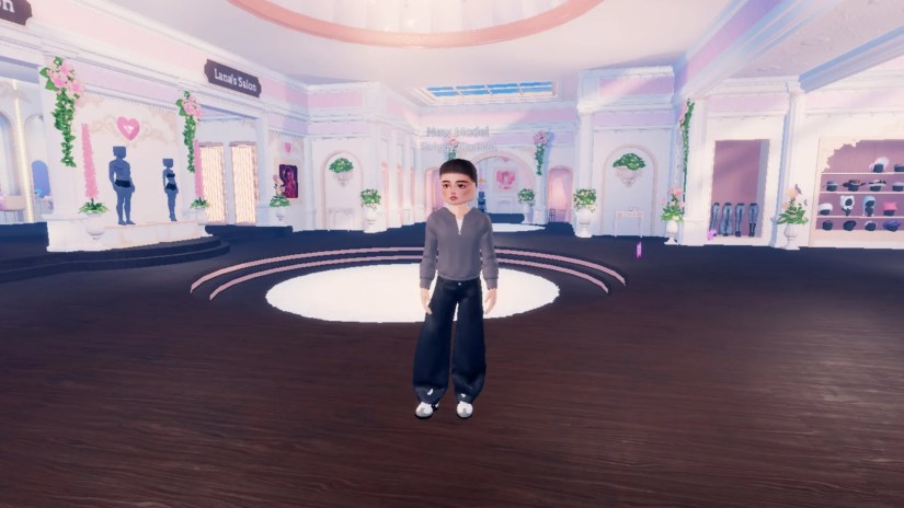 The player standing and looking to the left in Roblox Dress To Impress.