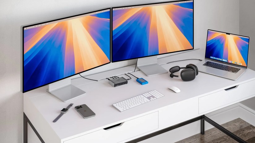 A multi-monitor Mac setup with the CalDigit Element 5 Hub.
