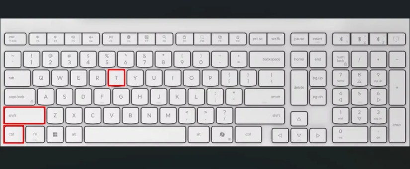 White keyboard with red boxes highlighting the Ctrl, Shift, and T keys.