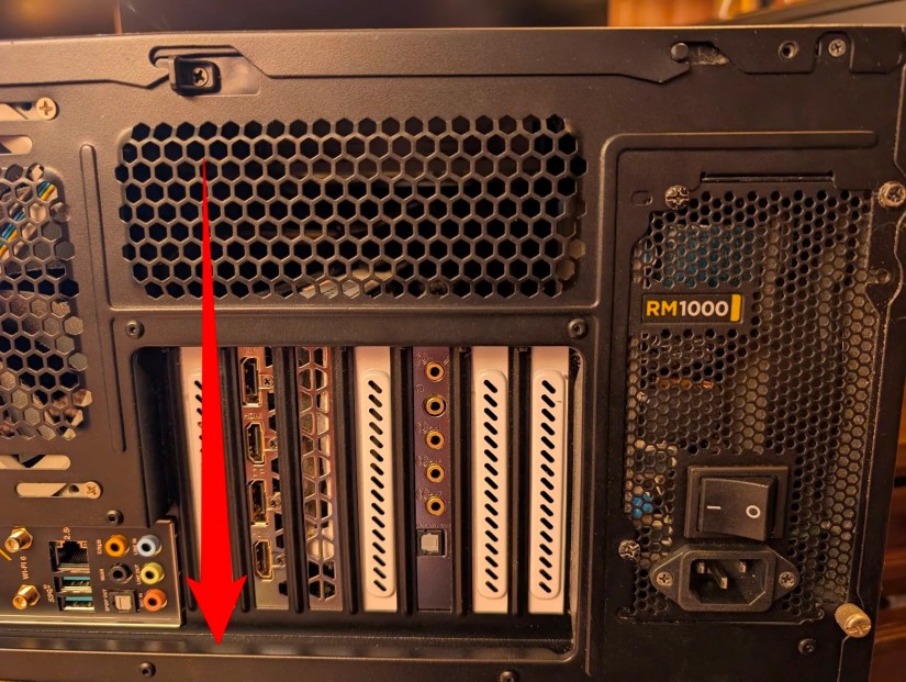 Place the side with the IO panel down.