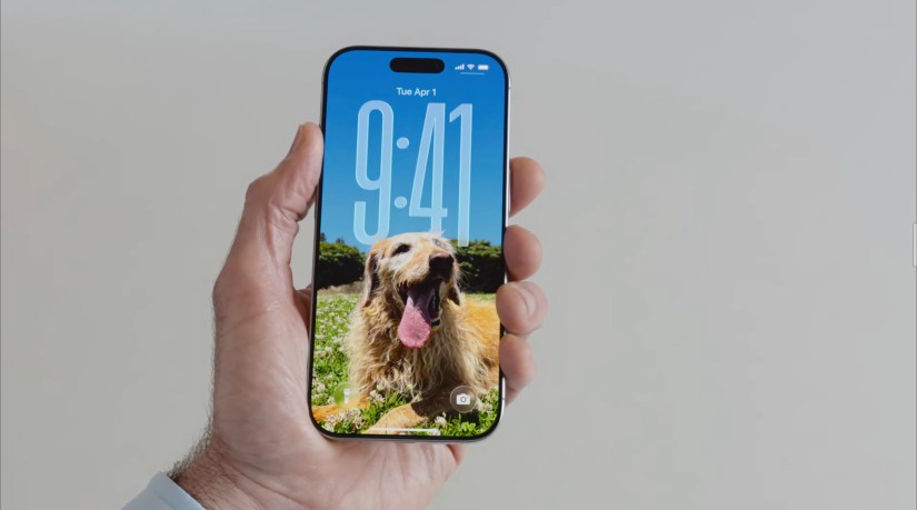 iOS 26 dynamic clock on lock screen.