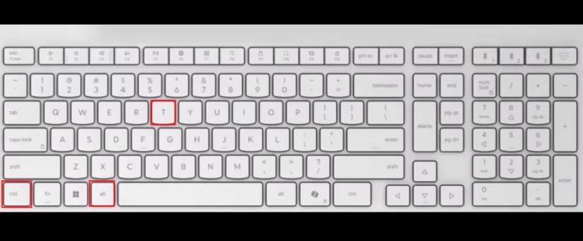 White keyboard with red boxes highlighting the Ctrl, Alt, and T keys.