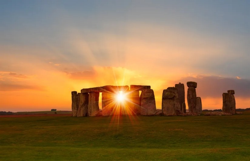 The sun passing through Stonehenge.