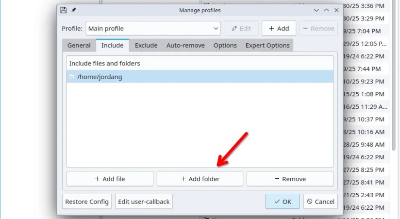 Red arrow pointing to the Add Folder button in Back in Time.