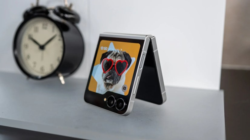 samsung galaxy z flip 7 fe sitting on a table with the cover display on 54641202522 o