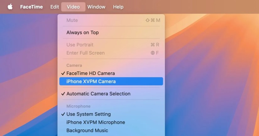 Selecting an iPhone as the source for FaceTime app on a Mac.