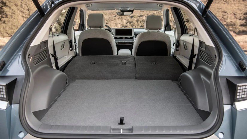 Shot inside the trunk of a 2023 Hyundai Ioniq 5 with the rear seats folded down.