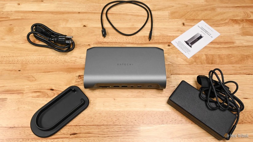 The Satechi Thunderbolt 4 Multimedia Pro Dock with cables, stand, and instructions.