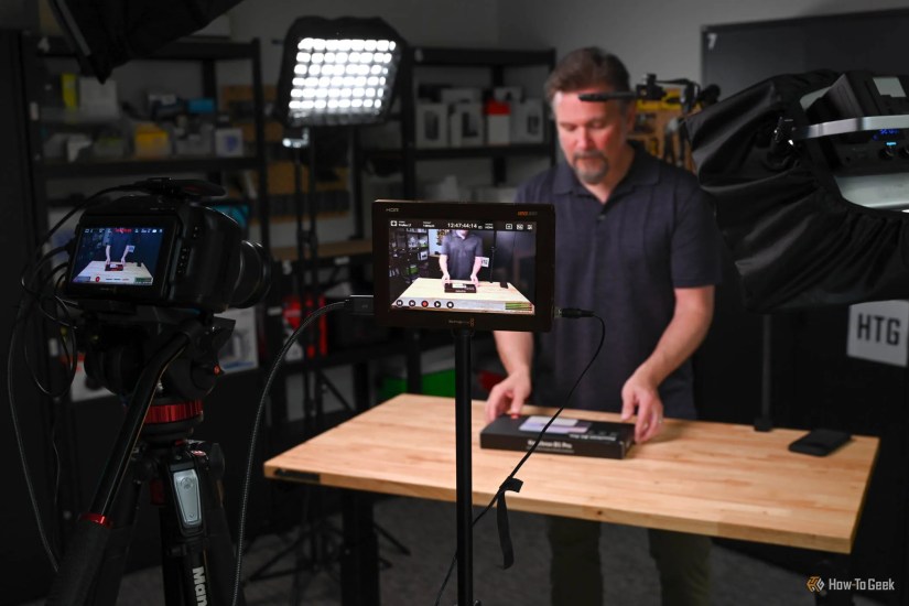 Camera equipment recording a person unboxing a product
