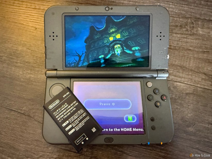Luigi&rsquo;s Mansion on a 3DS with a battery pack.