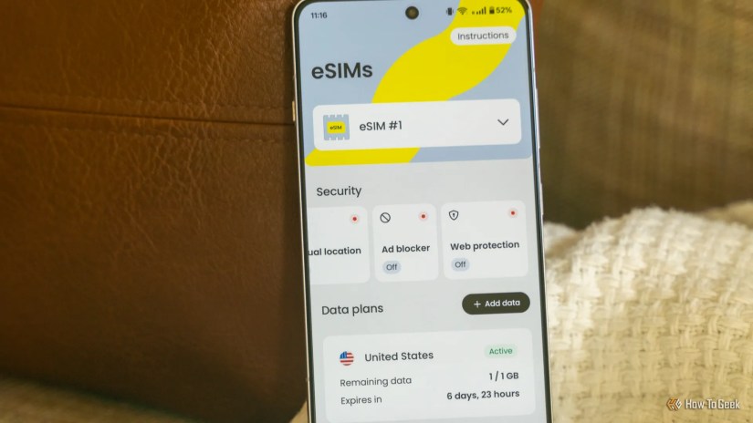 The home page of Saily&rsquo;s eSIM app on a OnePlus 13R sitting on a couch.