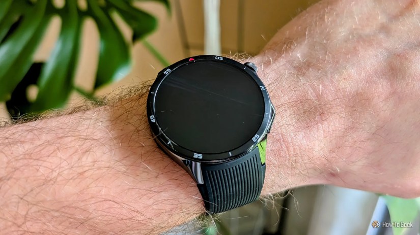 OnePlus Watch 3 on wrist with screen off.