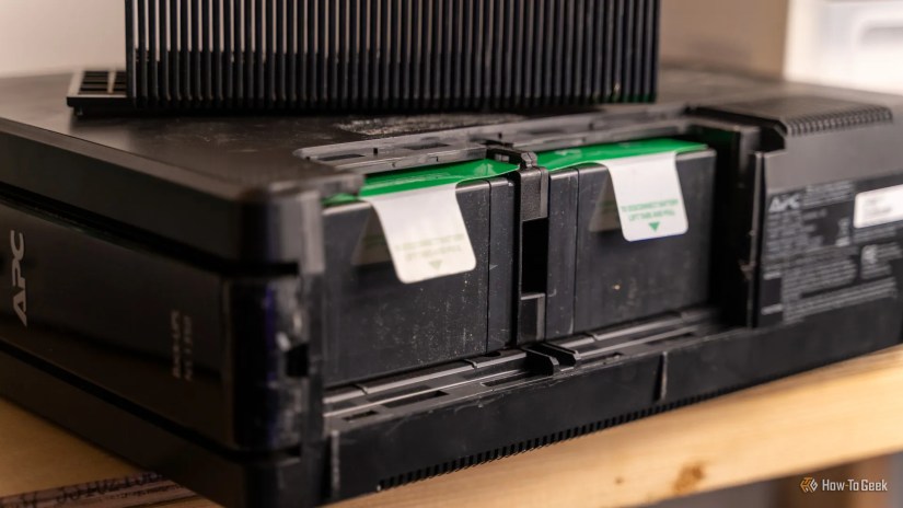 The battery port on the APC BackUPS NS1350 UPS.