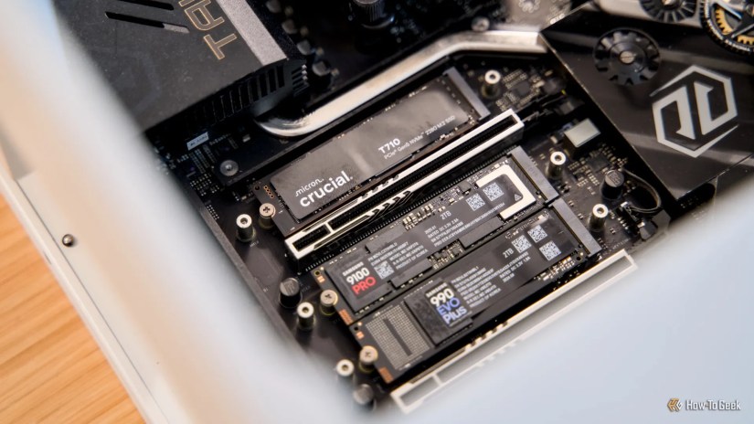 The Crucial T710, Samsung 9100 Pro, and Samsung 990 EVO Plus NVMe SSDs installed in a gaming desktop.