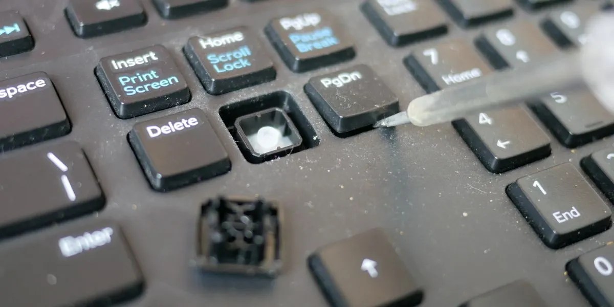 A Simple Trick for Cleaning Under Your Keyboard's Keys