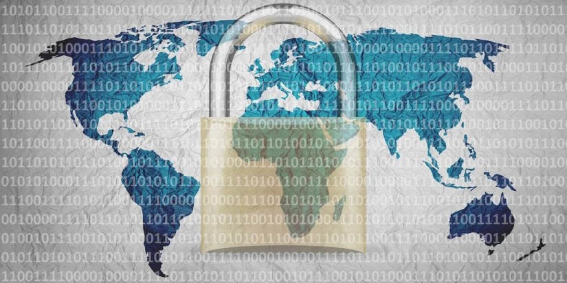 A Padlock Placed on the Worldmap in Binary Background