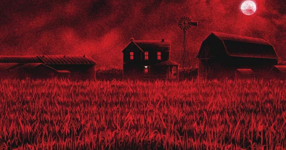 Clown dans un champ de maïs Les producteurs de Smile préparent un