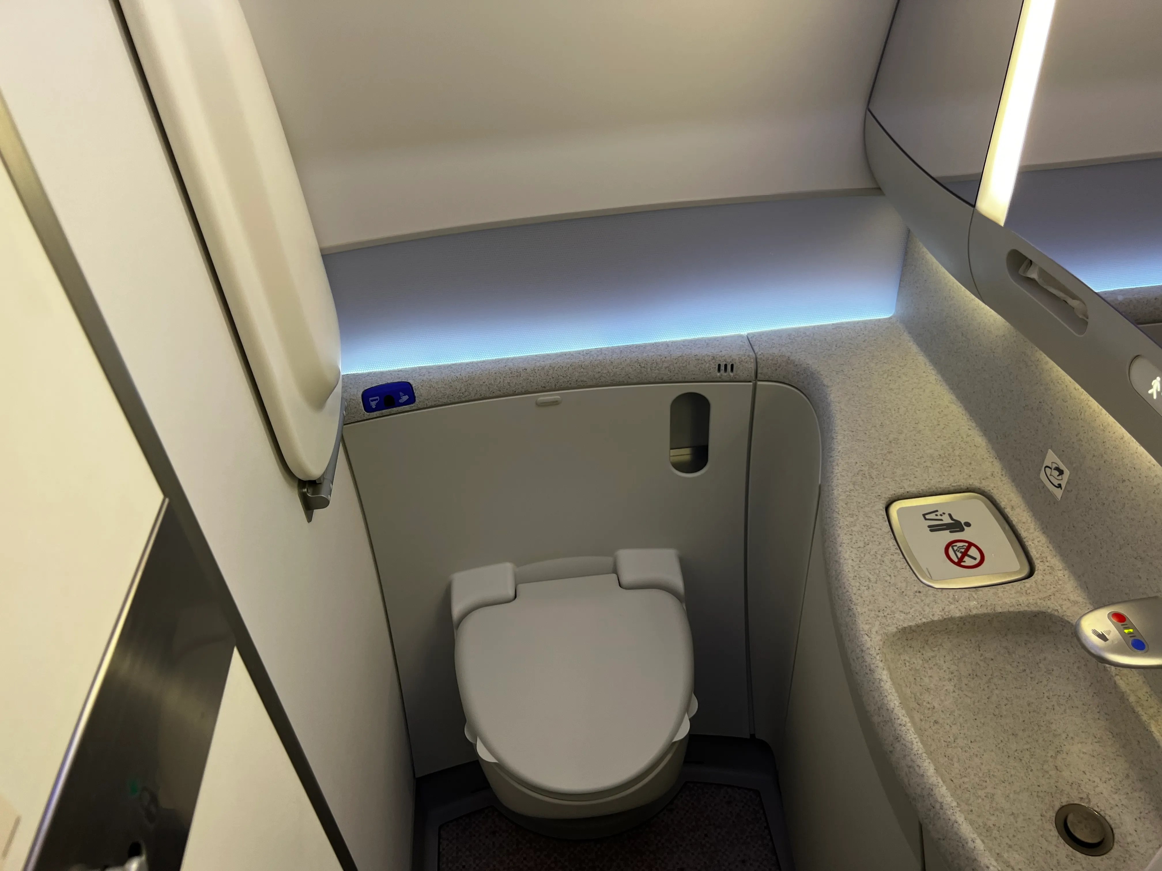 How Do Flush Mechanisms On Airplane Toilets Work?