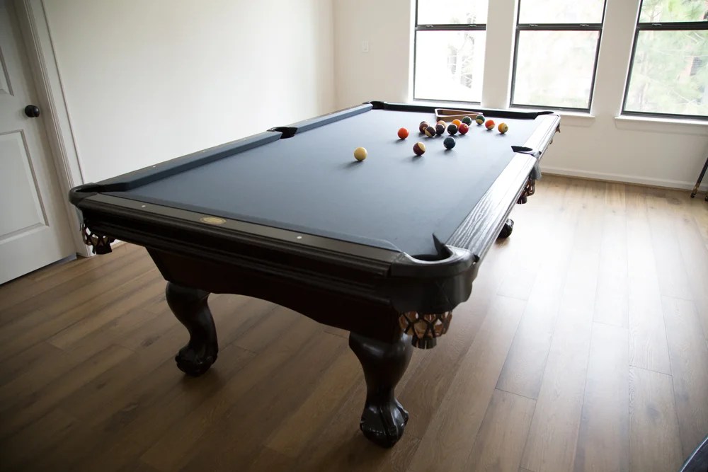 An Old Pool Table Is Restored To Complement A Contemporary Interior