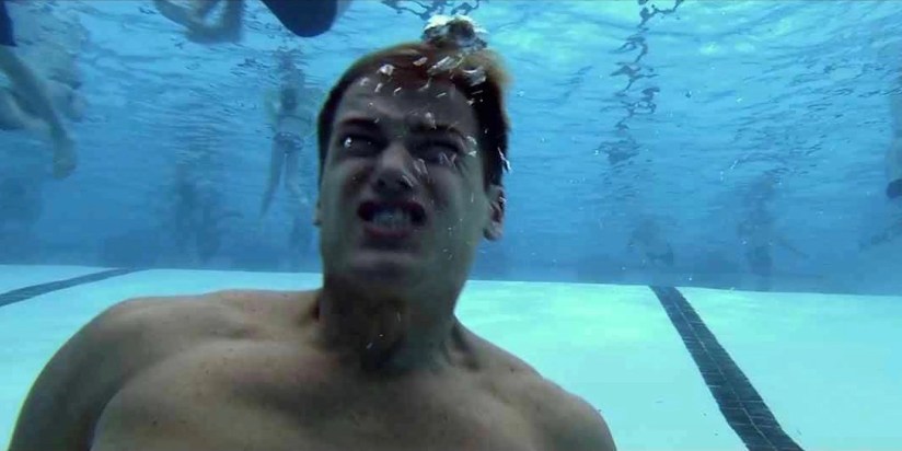 Nick Zano as Hunt stuck at the bottom of the pool in The Final Destination 2009