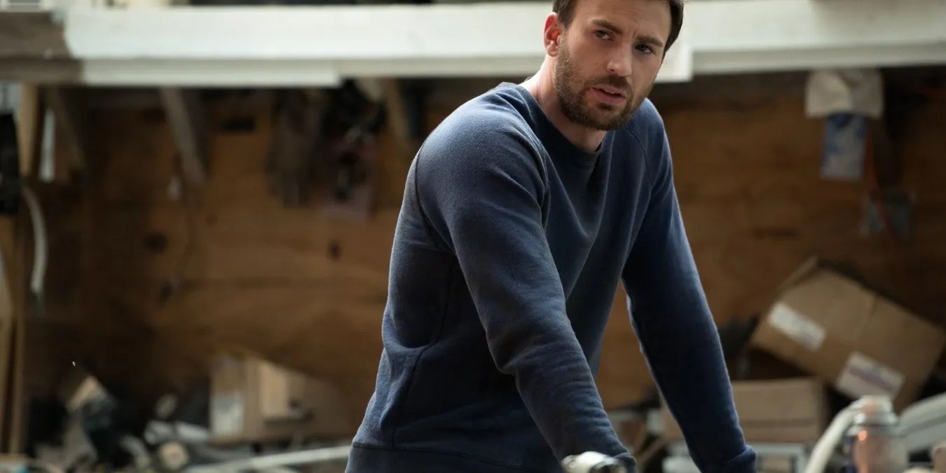 Chris Evans’s 10 Best Movie Outfits From Superhero Armor To Aran Sweaters