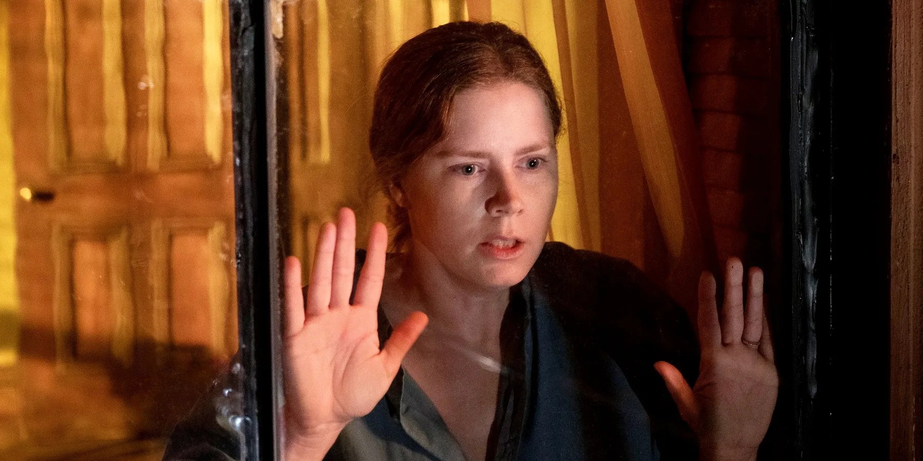 Woman In The Window Director Details Brutal Unseen Version Of Netflix Movie