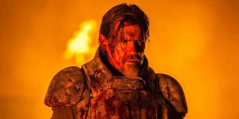 Josh Brolin as Gurney Halleck in front of a fiery orange background in Dune: Part Two