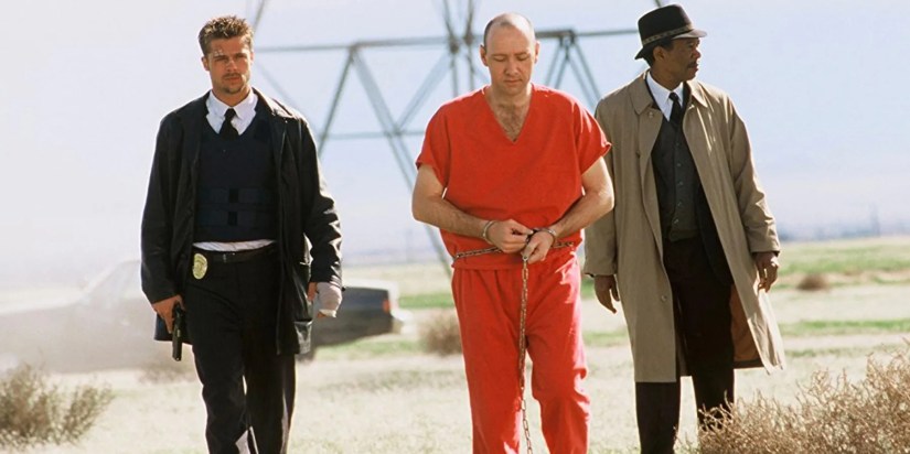 Brad Pitt as Mills, Kevin Spacey as John Doe, and Morgan Freeman as Somerset in the final scene as Se7en