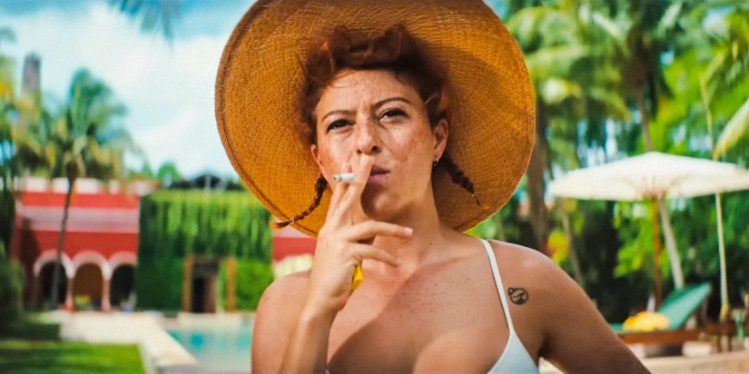 Jess (Alia Shawkat) smoking a cigarette in Blink Twice (2024)