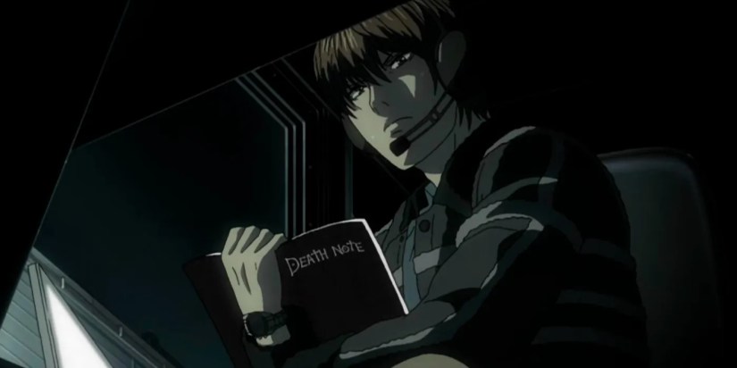Light Yagami holding the Death Note