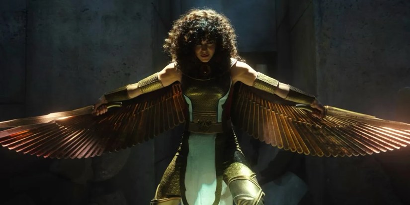 May Calamawy as Layla El-Faouly holding out her arms with wings attached in Moon Knight